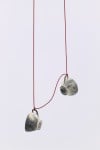 Teacups pendant by Almost Invisible