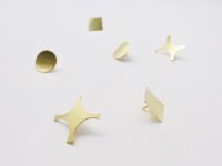 Gold confetti pins by Akiko Kurihara