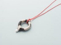 Milk cow pendant by Akiko Kurihara